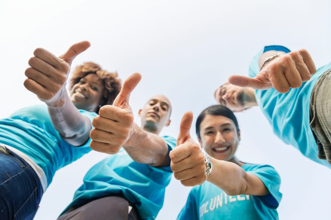 people giving the thumbs up sign