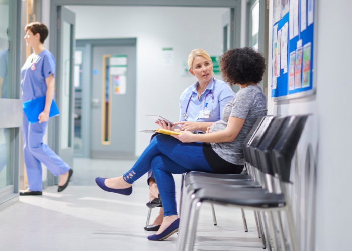 a nurse consults with an expecting mother