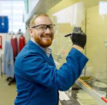 Andrew Riley in his lab. (Photo: Martin Hernandez/University of Illinois Chicago) 